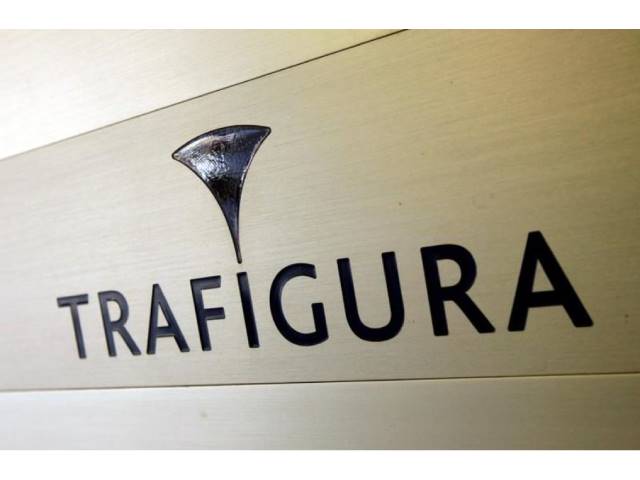 Trafigura logo is pictured in the company entrance in Geneva, Switzerland March 11, 2012. REUTERS/Denis Balibouse/File Photo
